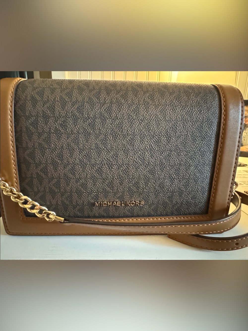 Michael Kors Black Pebbled Leather Crossbody with Brown Trim and Gold Chain